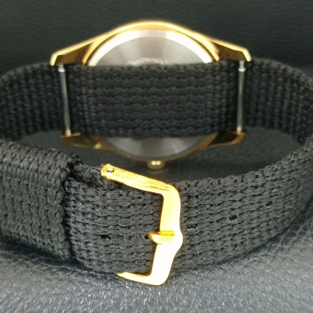 Vintage 1991 Roamer Manual Mens Gold Watch W/Nato Strap & Black accents
